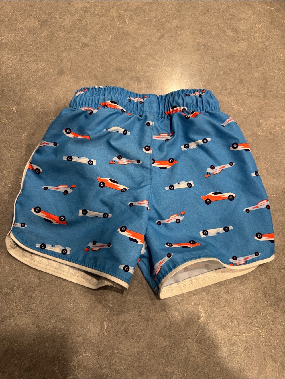 Cat & Jack Blue Boys Swim Trunks with Orange and White Race Cars - Picture 3 of 4